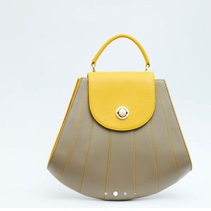 gisel tapered top handle leather handbag - sun stone